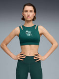 PUMA Спортен сутиен GREEN TERRAINS GRAPHIC BRA - MID