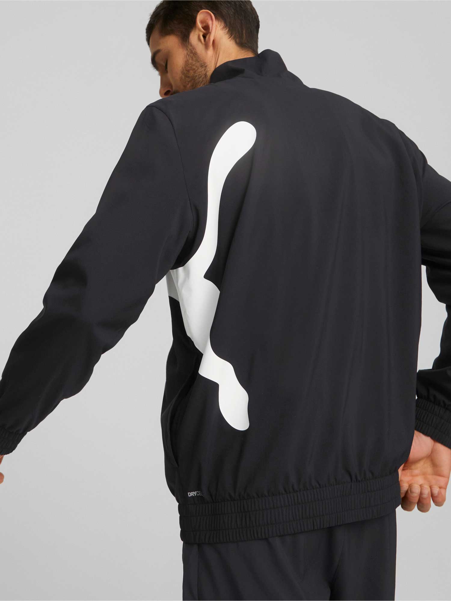 PUMA Спортно горнище TRAIN BIG CAT LINED WOVEN
