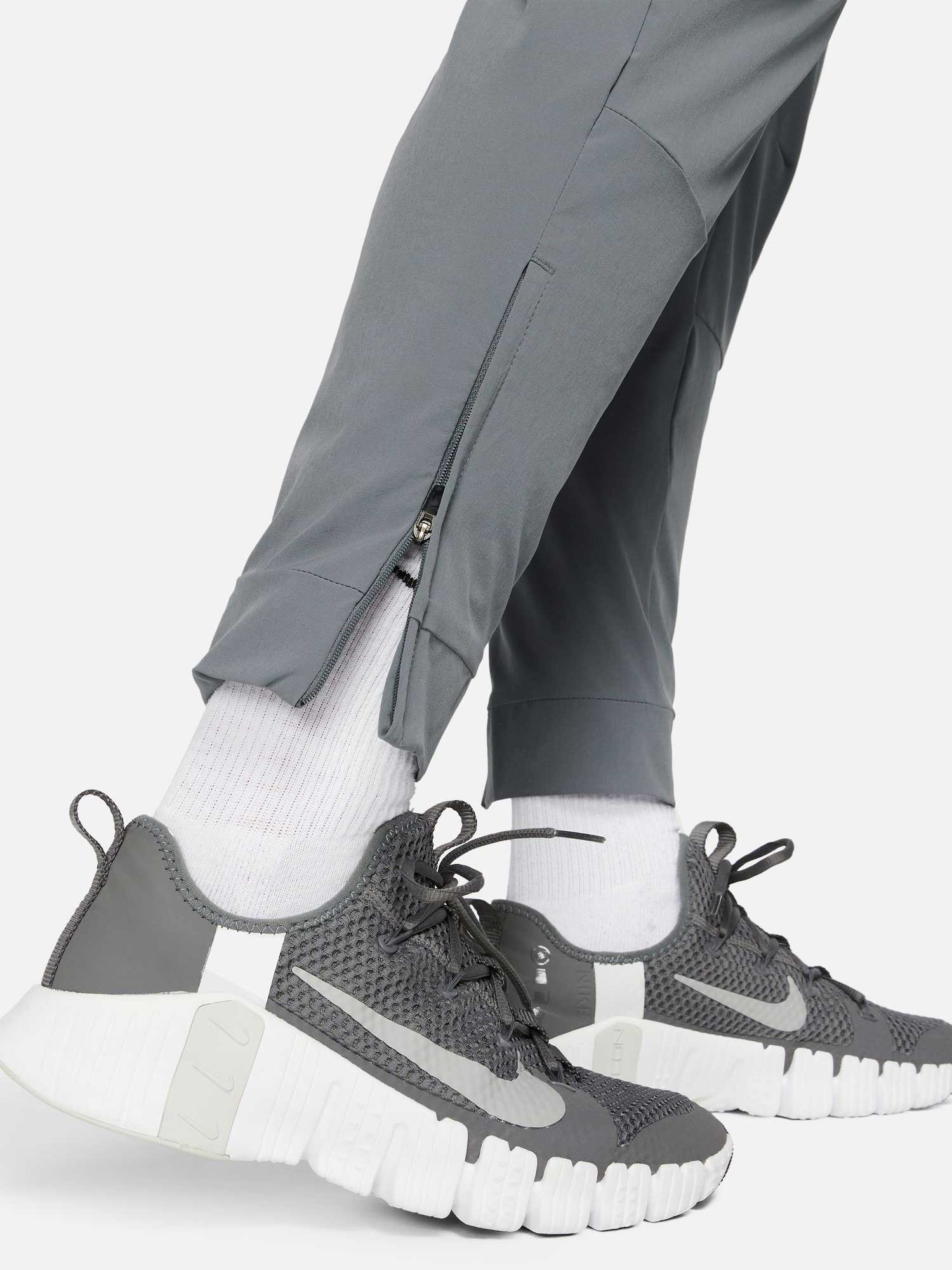 NIKE Спортно долнище M NK DF UNLIMITED PANT TPR